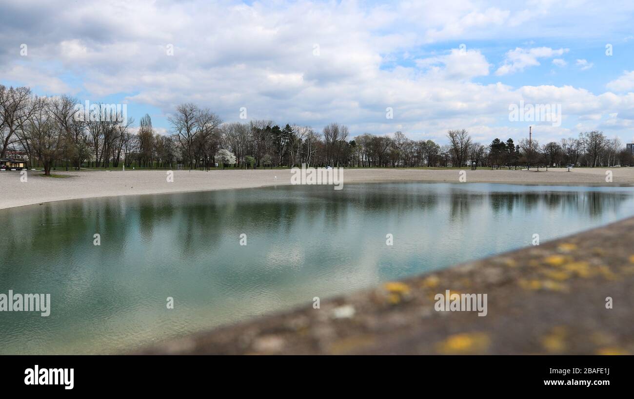 Storm sky over empty Bundek lake in Zagreb due to Corona virus epidemy Stock Photo