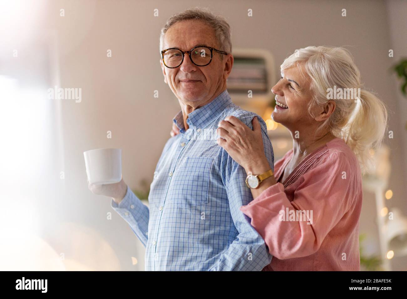 Portrait of a happy senior couple relaxing together at home Stock Photo