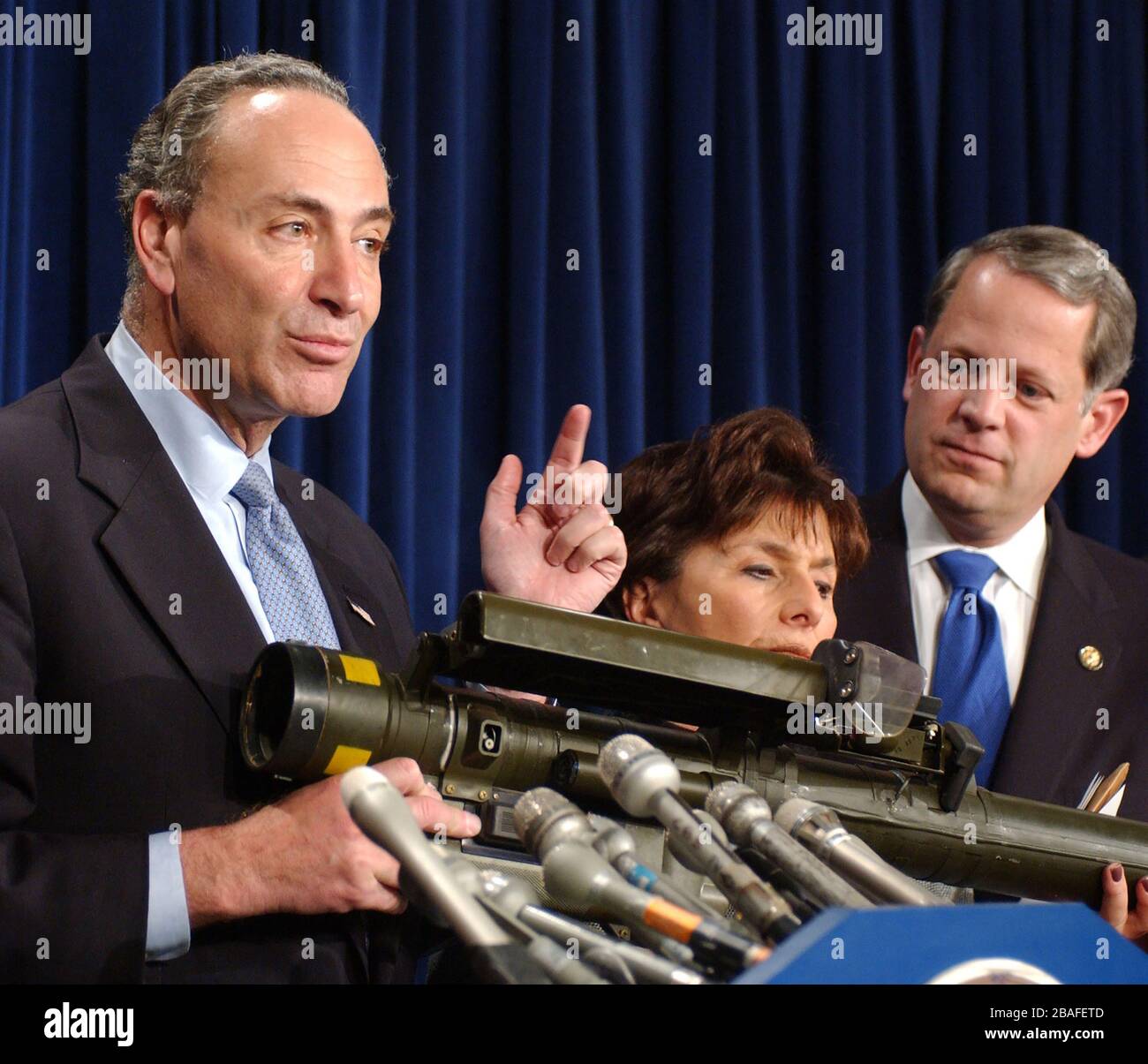 United States Senator Chuck Schumer (Democrat of New York), left, joined with bi-partisan colleagues at a Capitol Hill press conference in Washington, DC on April 2, 2003.   Schumer, who was joined by US Senator Barbara Boxer (Democrat of California), center, US Representative Steve Israel (Democrat of New York), right, and US Representative John Mica (Republican of Florida), said they would seek $30 million in the supplemental appropriations bill to research, develop, and begin deploying technology to protect commercial aircraft from the threat posed by shoulder-fired missiles.Credit: Ron Sac Stock Photo