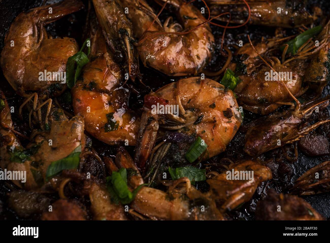 Shrimp Scampi is quick and easy Asian dish that can be served with noodles Stock Photo