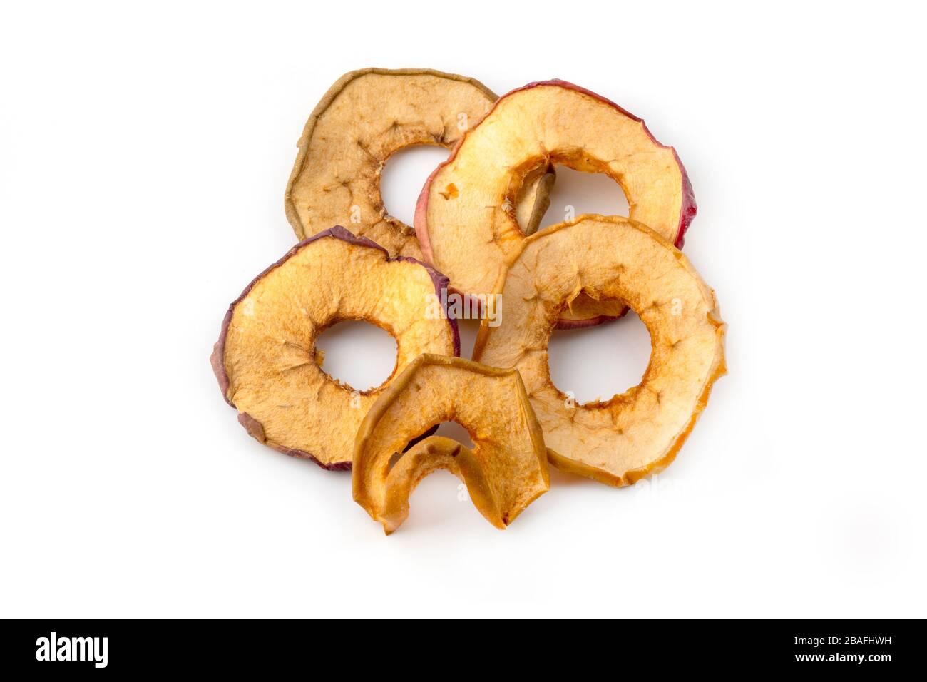 Oven dried crispy apples on a white background Stock Photo