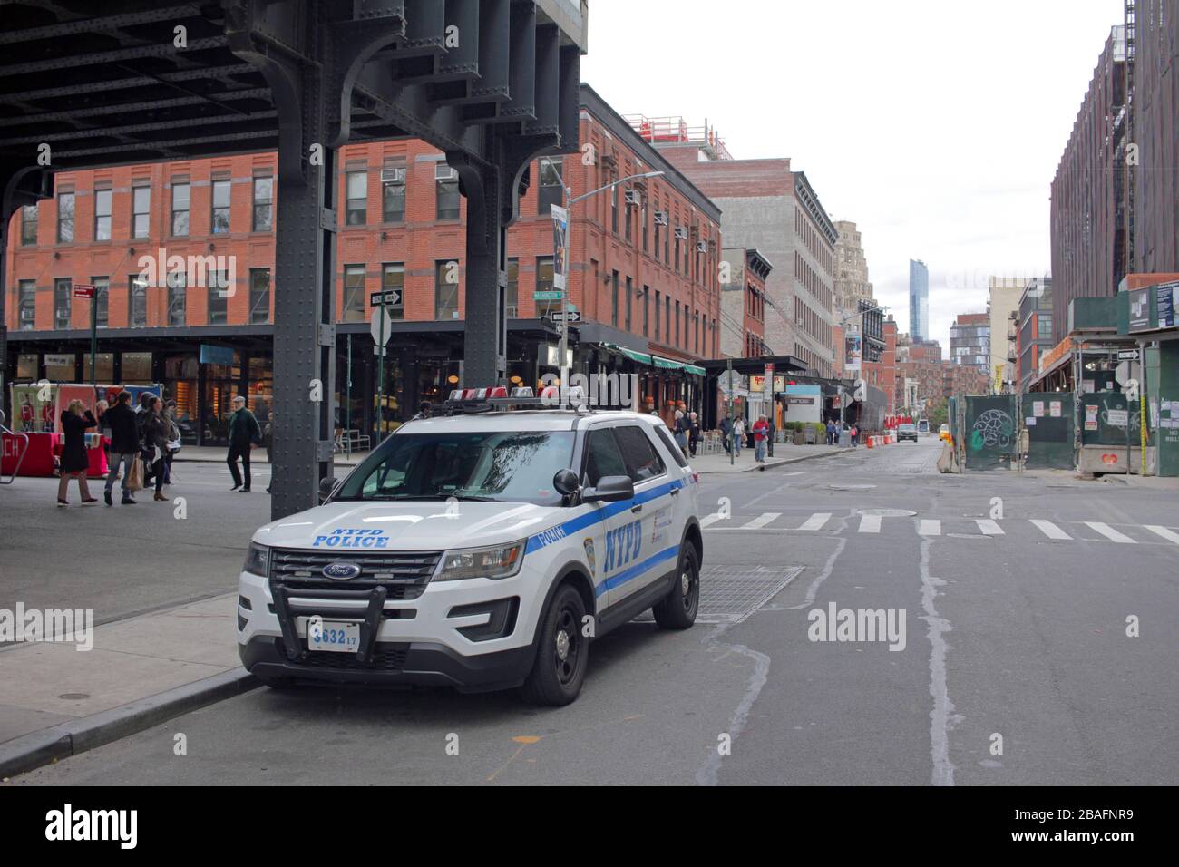 NYPD vehicle under the High Line, Meatpacking District, New York City, USA Stock Photo