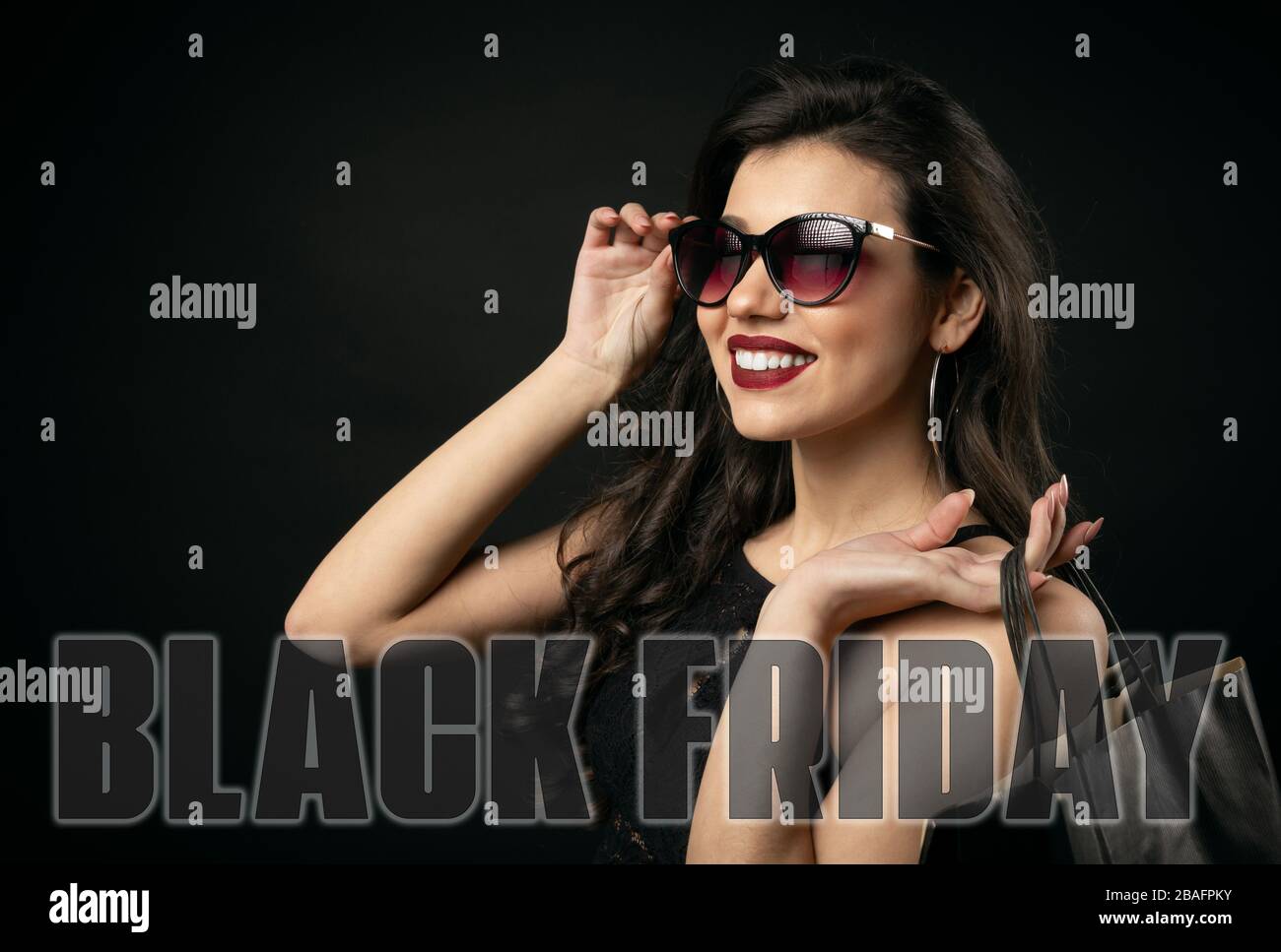 Beauty holding shopping bags portrait Stock Photo - Alamy