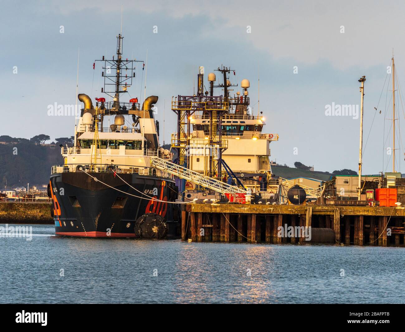Tugs moored at Falmouth Docks. Alp Ace Tug moored at Falmouth Cornwall UK. Stock Photo