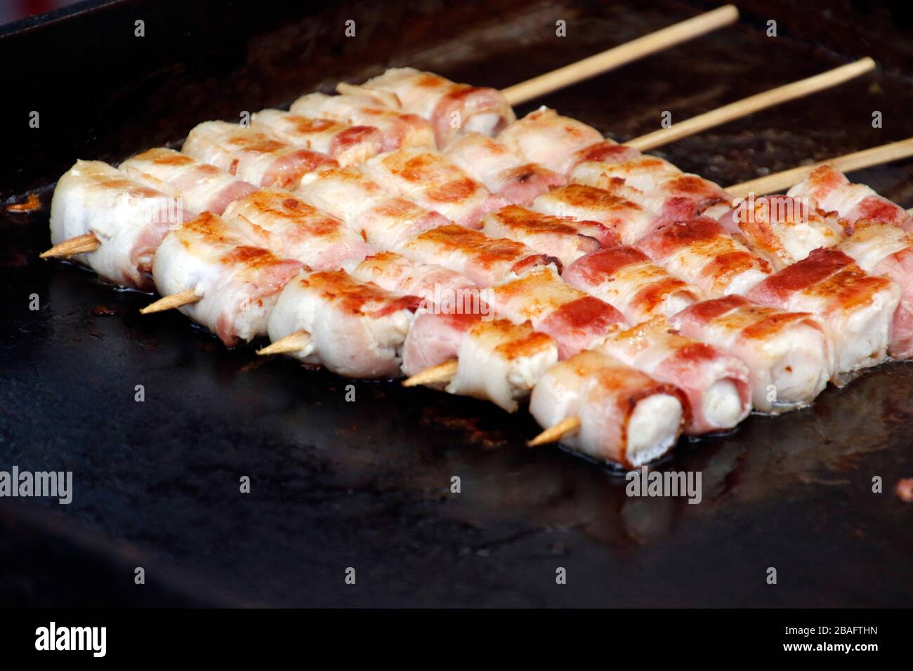 closeup of some meat skewers on barbecue grill Stock Photo