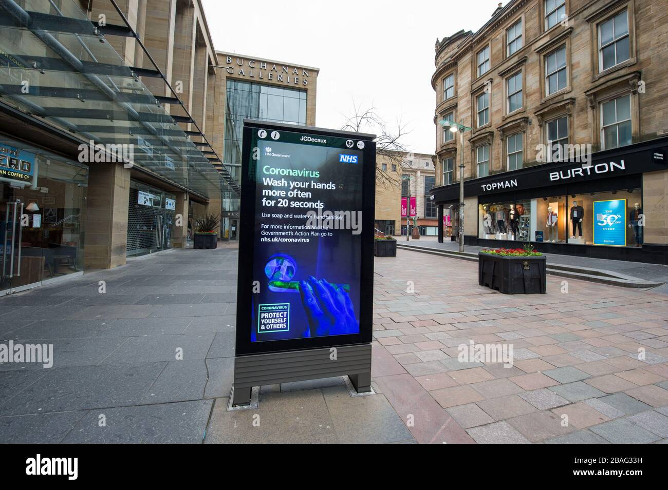 Glasgow, UK. 27th Mar, 2020. Pictured: Public Safety Information Notices advising the public about Coronavirus. Views of Glasgow City Centre showing empty streets, shops closed and empty railway stations during what would normally be a busy street scene with shoppers and people working within the city. The Coronavirus Pandemic has forced the UK Government to order a shut down of all the UK major cities and make people stay at home. Credit: Colin Fisher/Alamy Live News Stock Photo