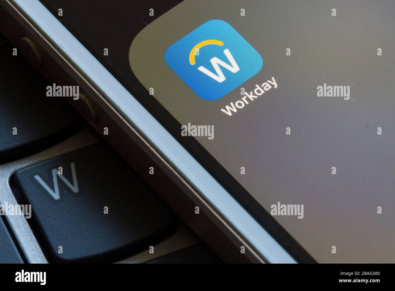 Workday mobile app icon closeup. The Workday app provides mobile access to Workday cloud platform enterprise-class applications on the go. Stock Photo