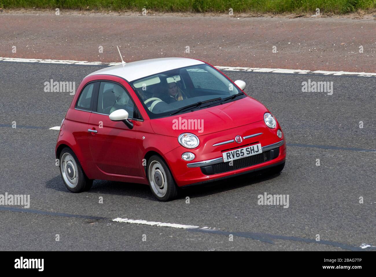 2015 RED Fiat 500 Vintage 57; Vehicular traffic, moving vehicles, vehicle driving, roads, motors, motoring  on the M6 motorway highway Stock Photo