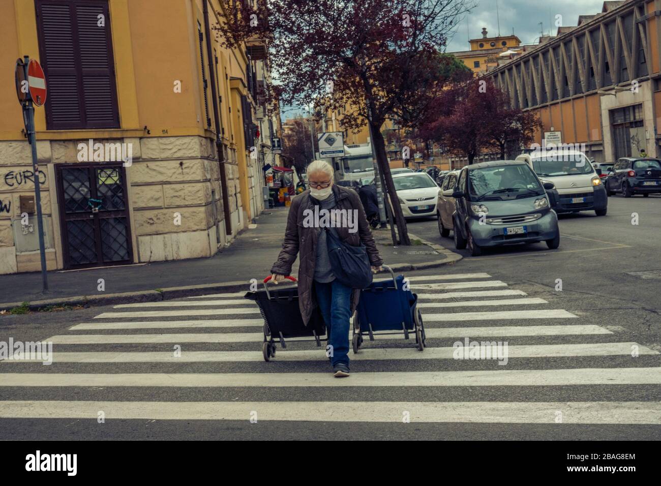 Going (heavy) to grocery (Rome at the time of Covid 19) Stock Photo