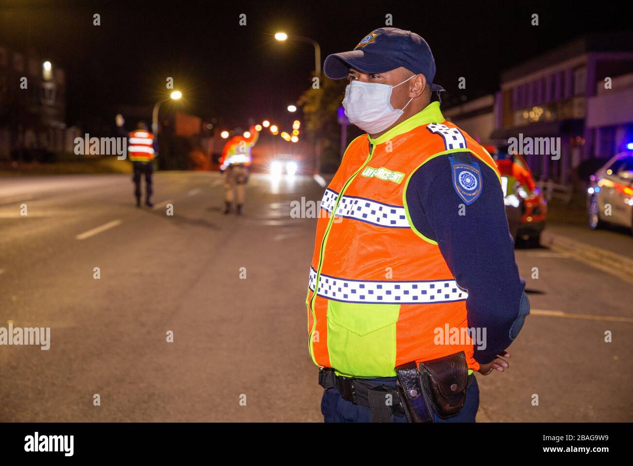 Cape Town, South Africa. 27th Mar, 2020. CAPE TOWN, SOUTH AFRICA - Friday  27 March 2020: a Law Enforcement officer of the City of Cape Town, at a  roadblock to ensure that
