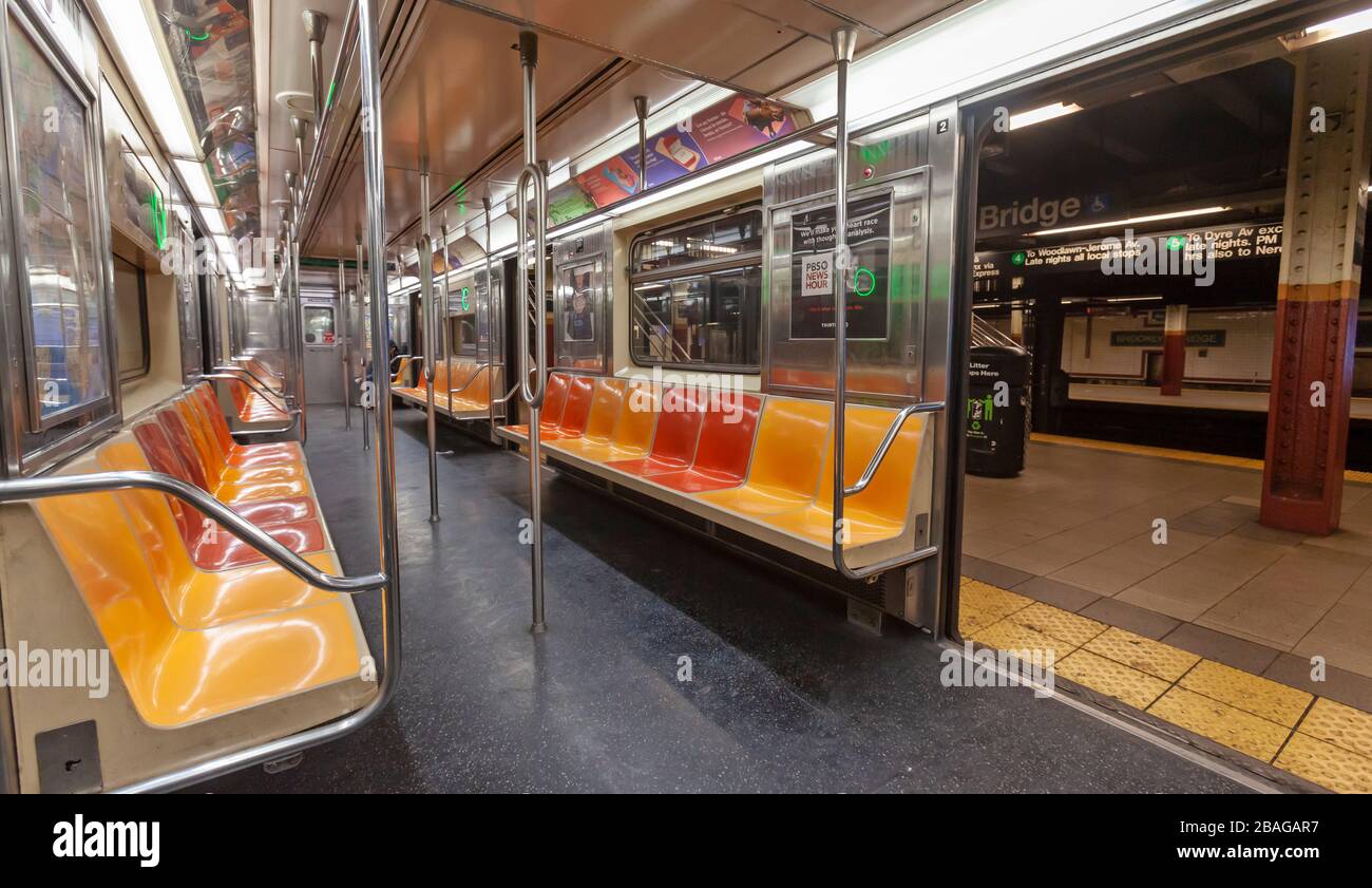 Very few passengers riding the subway in New York City because of COVID-19, Coronavirus. Stock Photo