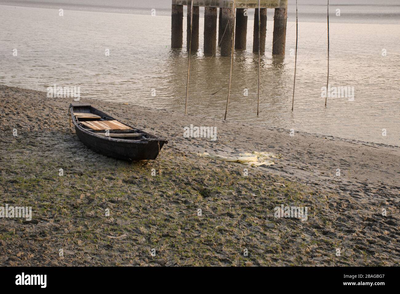 lonely boat at matla river canning west bengal Stock Photo