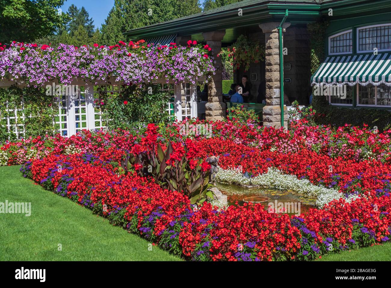 Garden Scene and patio in September at Butchart Gardens, Victoria, British Columbia, Canada. Stock Photo
