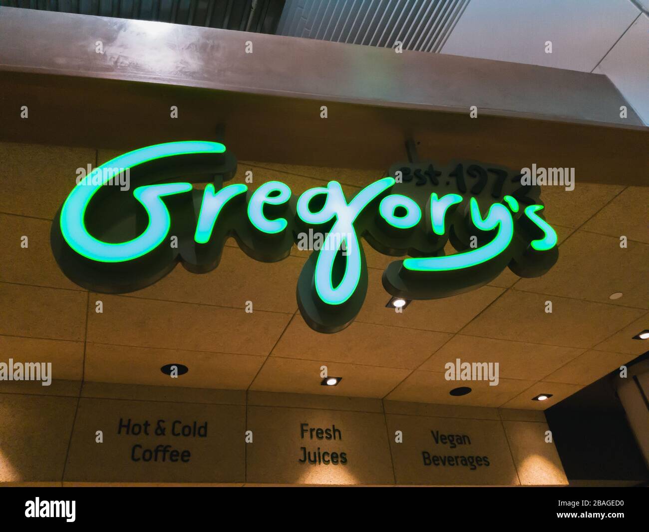 Athens, Greece - February, 11 2020: A Gregory's cafe logo inside the Athens International Airport Eleftherios Venizelos. Gregory's is the 9th biggest Stock Photo