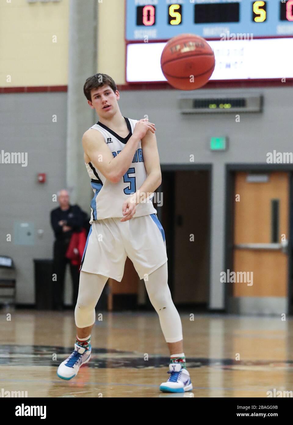 Basketball action with Northwest Christian vs Freeman High School in