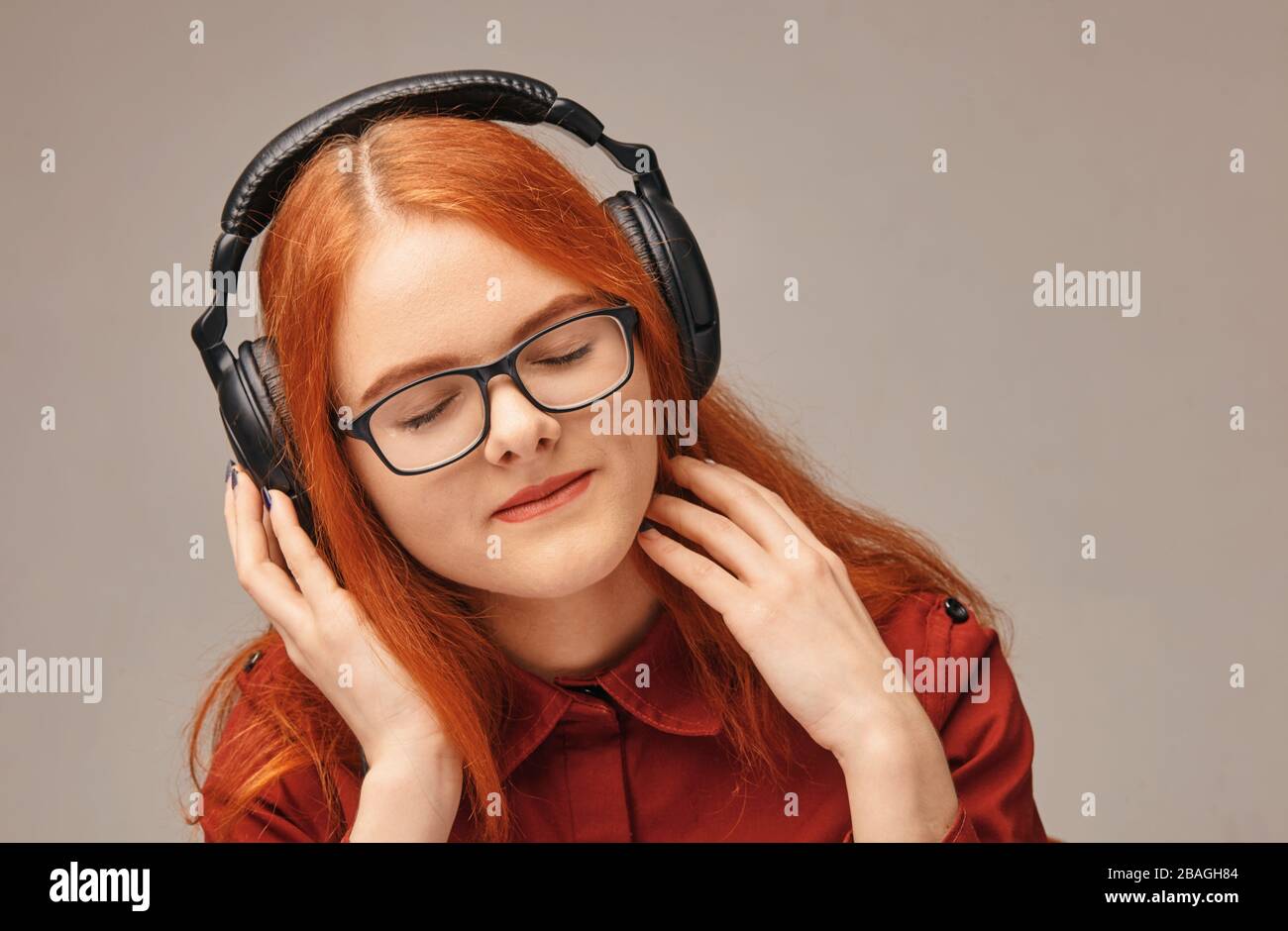 very happy young girl listening to music in headphones Stock Photo - Alamy