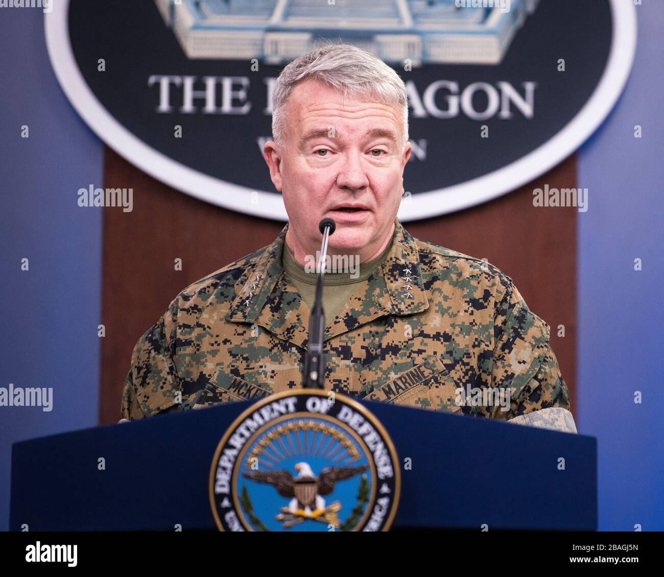 The commander of U.S. Central Command, Marine Corps Gen. Kenneth F. McKenzie Jr., briefs reporters on the status of operations in the CENTCOM area of responsibility and the COVID-19 pandemic at the Pentagon March 13, 2020 in Arlington, Virginia. Stock Photo