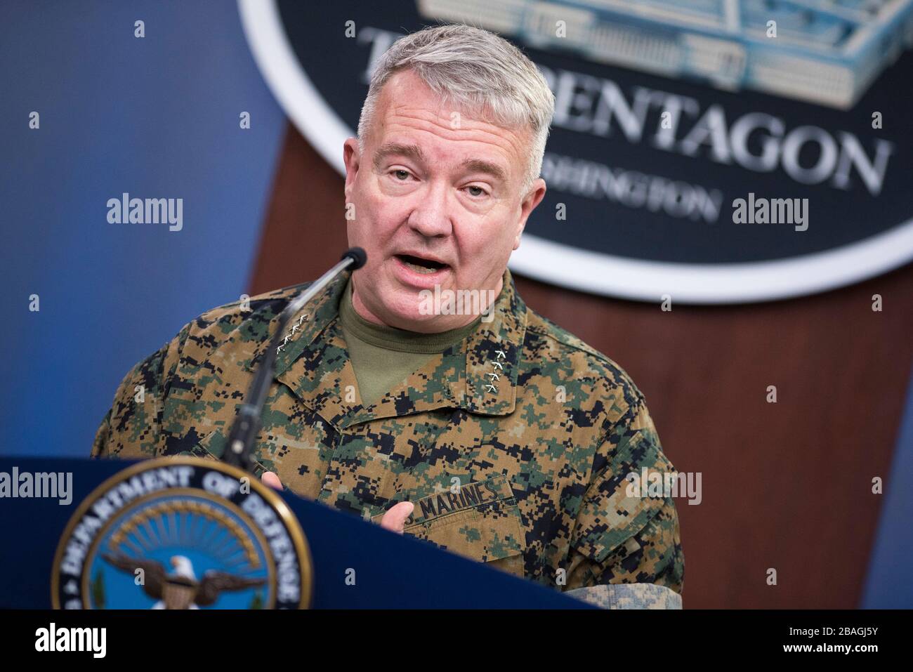 The commander of U.S. Central Command, Marine Corps Gen. Kenneth F. McKenzie Jr., briefs reporters on the status of operations in the CENTCOM area of responsibility and the COVID-19 pandemic at the Pentagon March 13, 2020 in Arlington, Virginia. Stock Photo