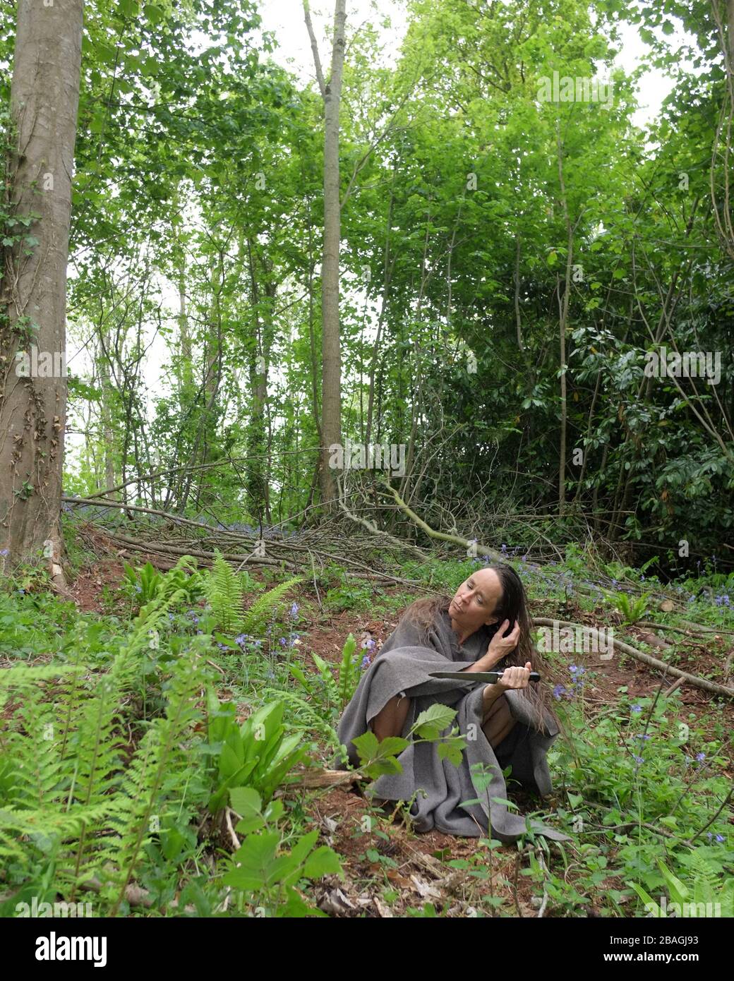 August 2015 - Wild woman in the woods Stock Photo