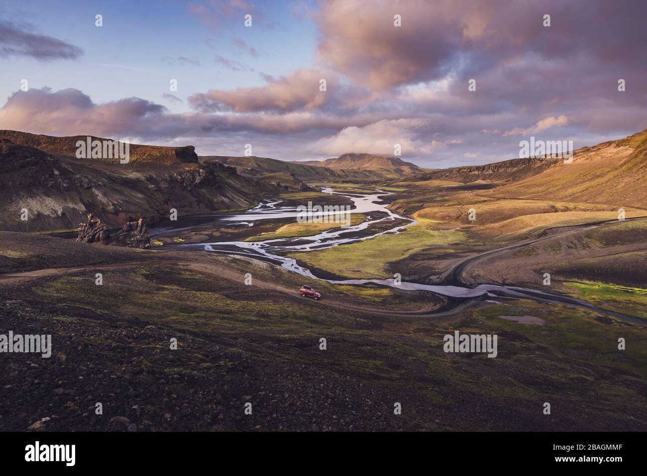 View of 4x4 about to cross river in wild valley in highlands Iceland Stock Photo