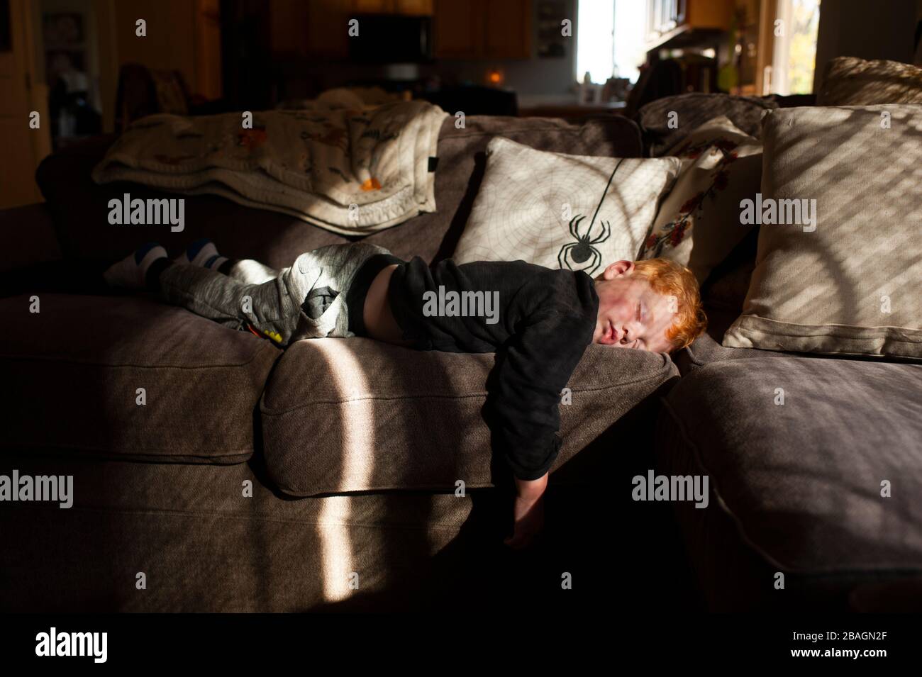 Boy laying on stomach hires stock photography and images Alamy