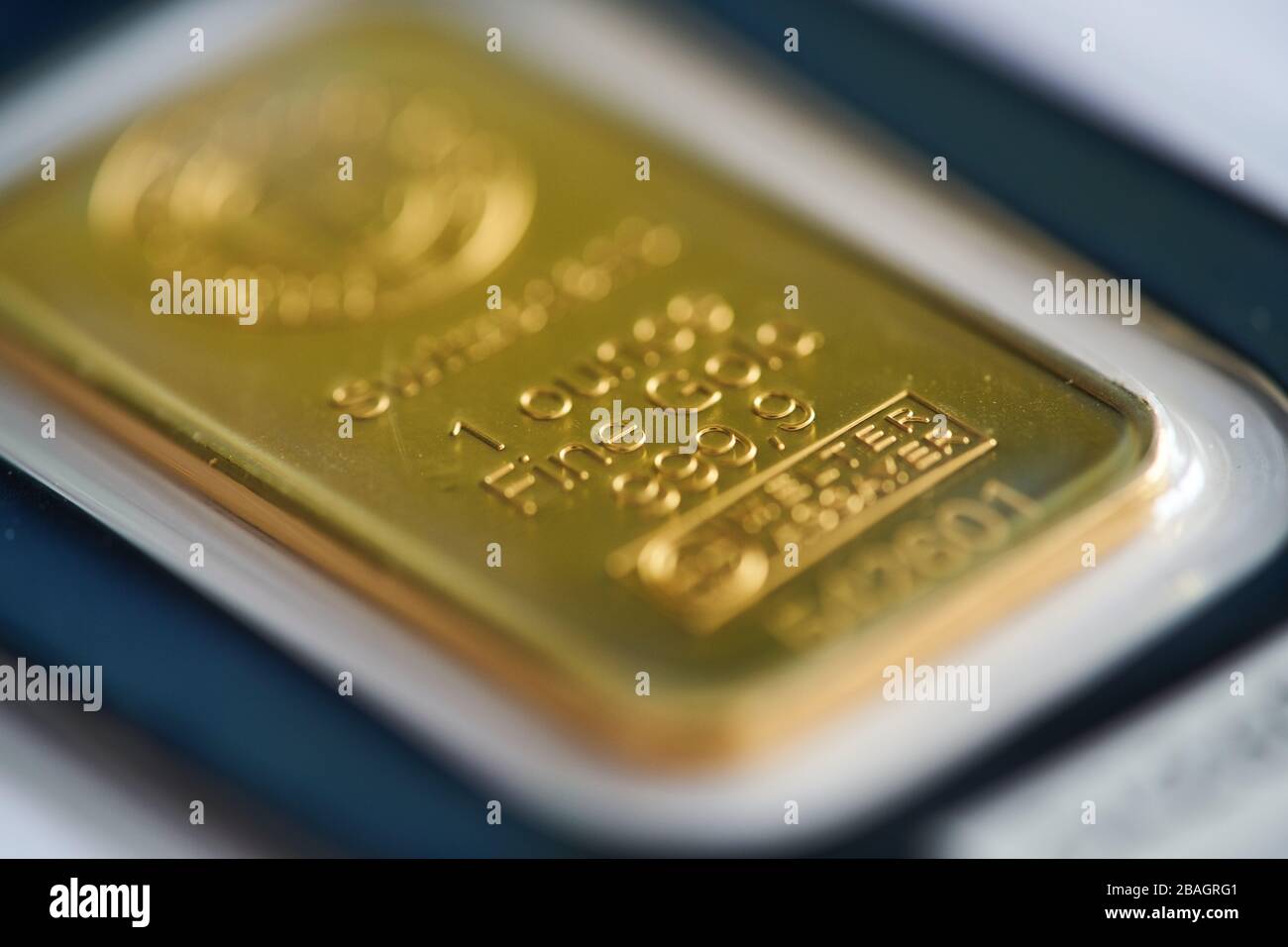 MUNICH, GERMANY - MARCH 27: Gold bars in the window of a gold trader on March 27, 2020 in Munich, Germany. © Peter Schatz / Alamy Live News Stock Photo