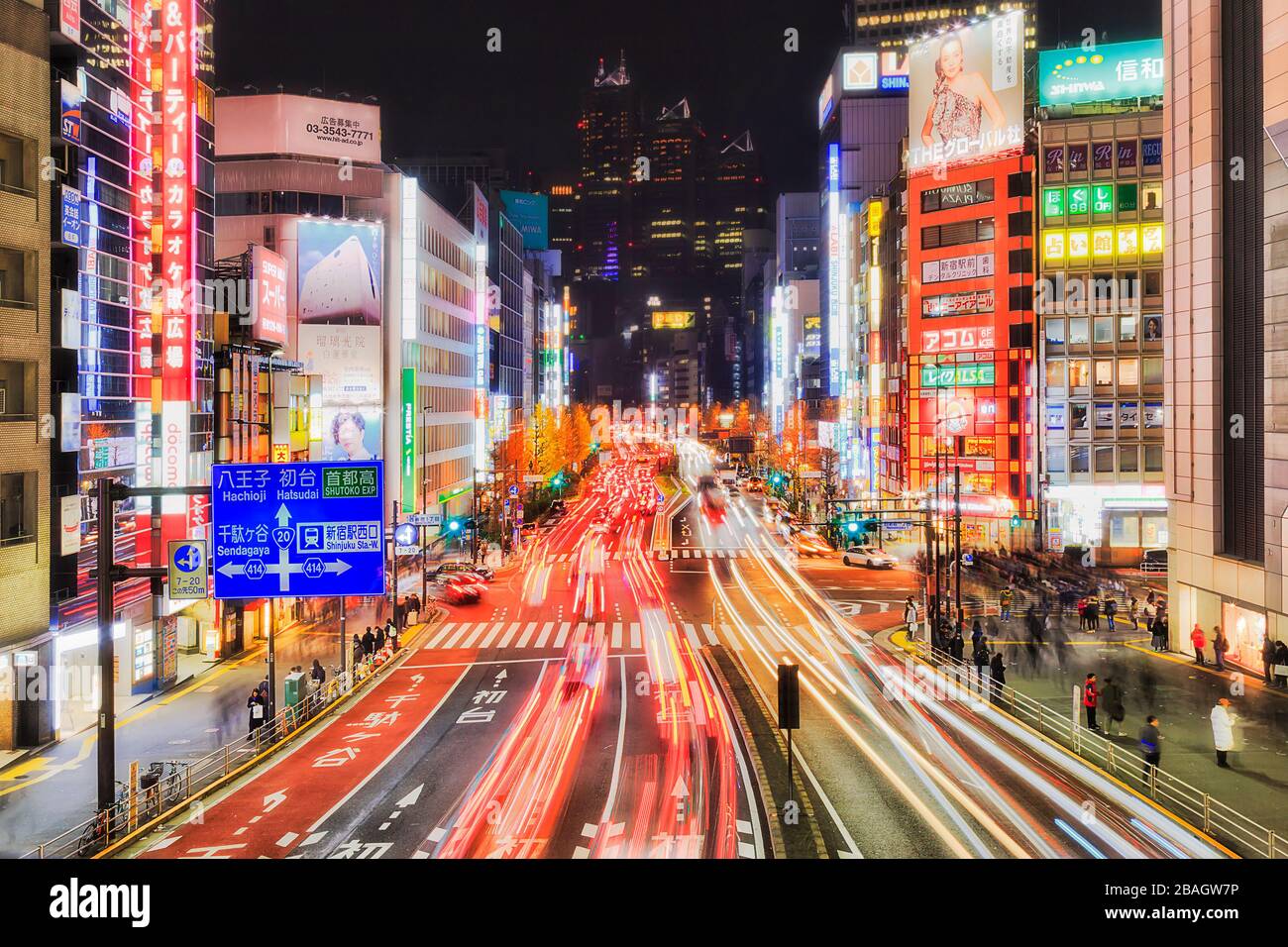 Tokyo, Japan - 31 Dec 2019: Tokyo city in Japan around Shinjuku-Shibuya business districts at night with bright illuminations and crowds of people cro Stock Photo