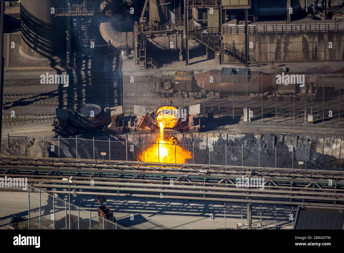 incandescent slag in Duisburg at steelword Bruckhausen, 12.03.2015, aerial view, Germany, North Rhine-Westphalia, Ruhr Area, Duisburg Stock Photo