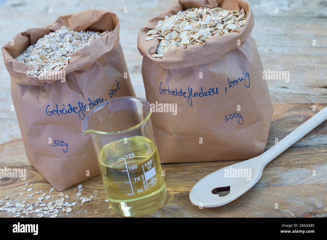 making bird seed with cereal and oil, series picture 1/4 Stock Photo