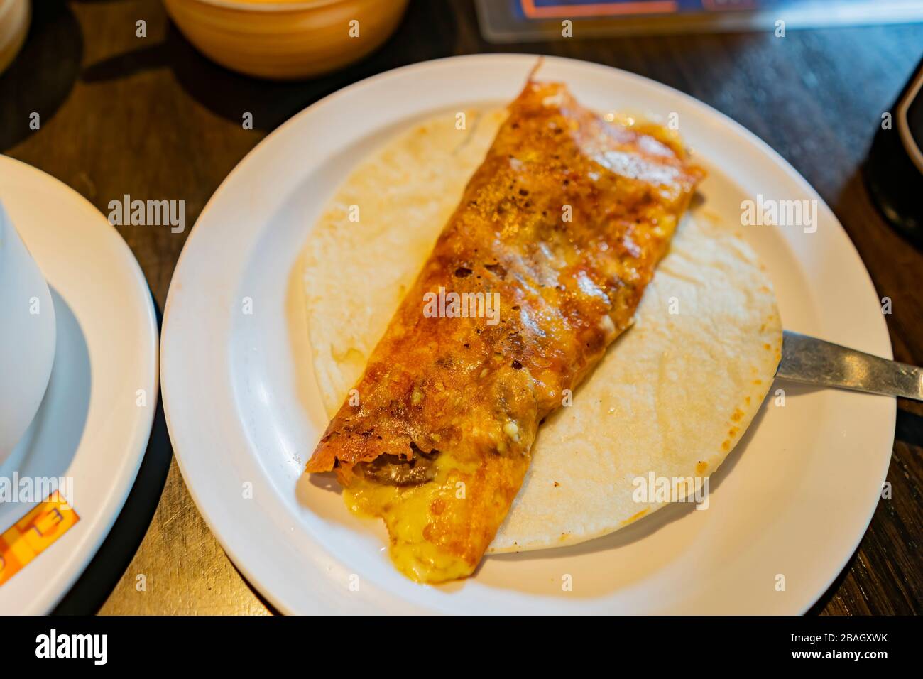 Close up shot of a Mexician style egg wrap with Taco, ate at Mexico City Stock Photo