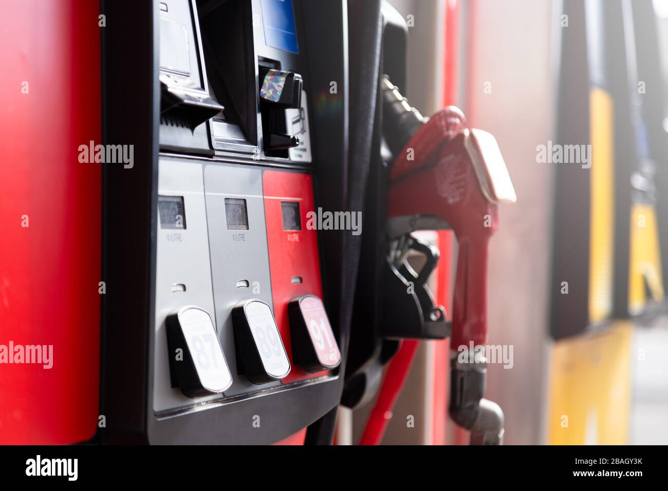 Side view of a gasoline pump with sunburst on the side, no logos . Stock Photo