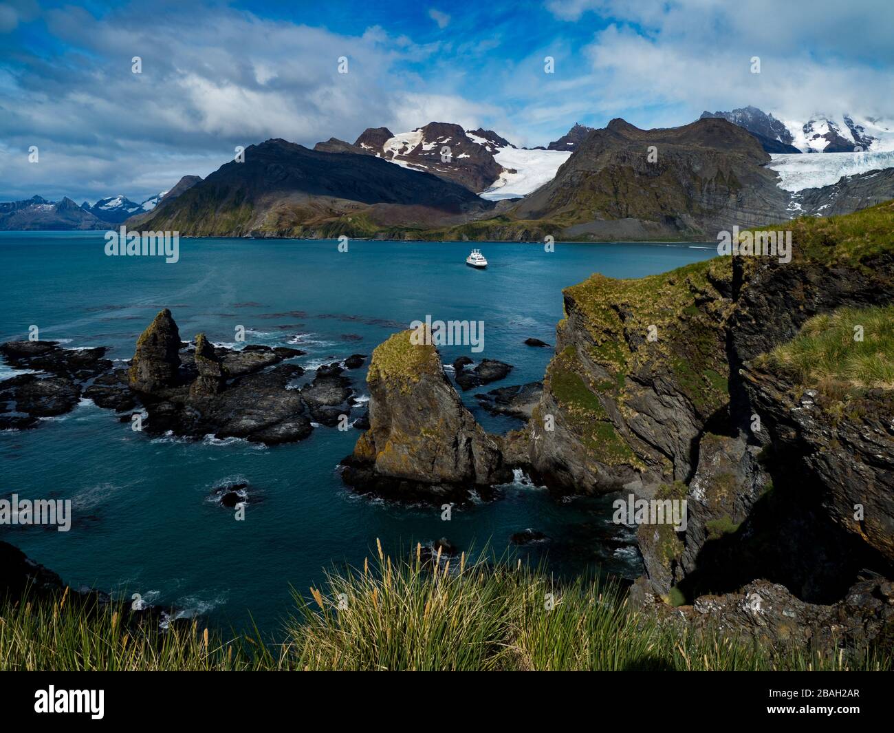 Stunning views over Gold Harbor, South Georgia Island with the National Geographic Orion Stock Photo