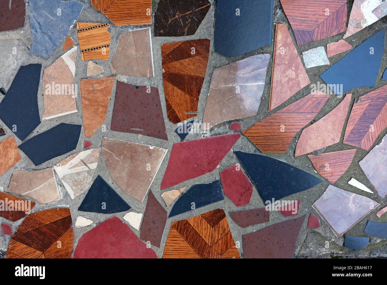 Fragment Of A Floor From Pieces Of A Multi Colored Tile Background