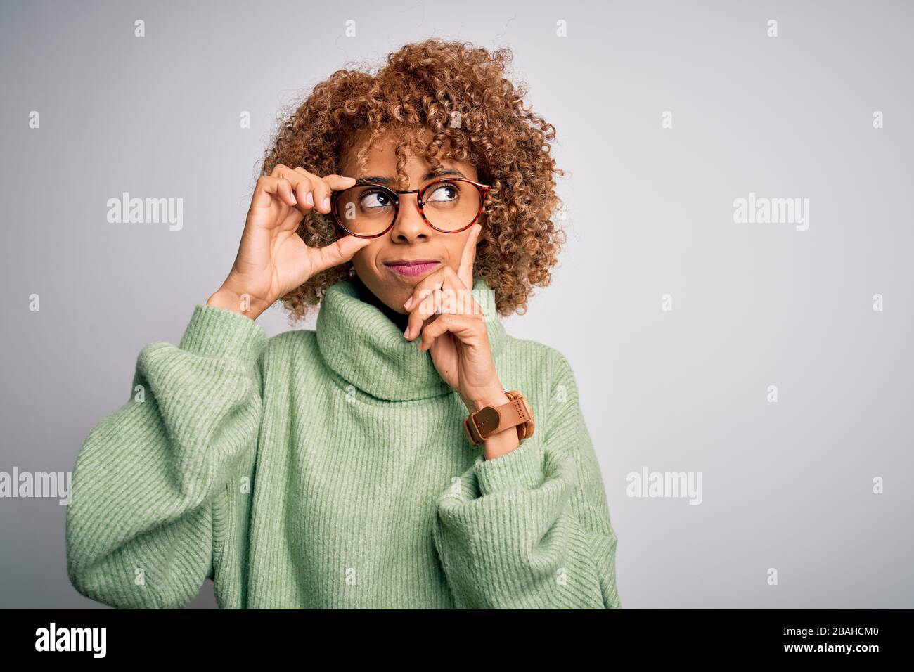 African american optical woman with curly hair wearing glasses over ...