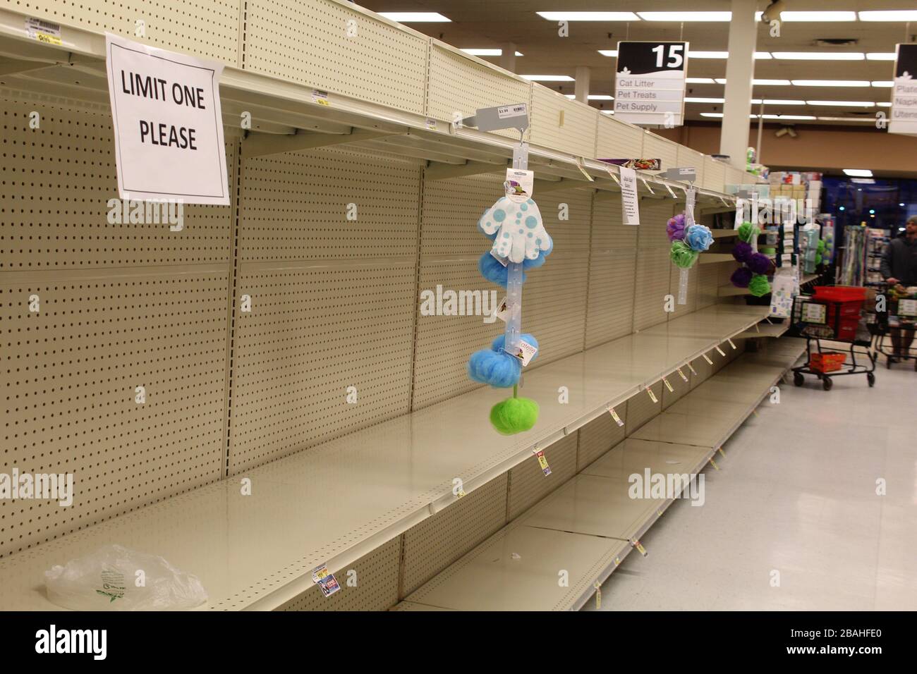 Empty toilet paper aisle at a grocery store in Niles, Illinois during the COVID19 outbreak Stock Photo