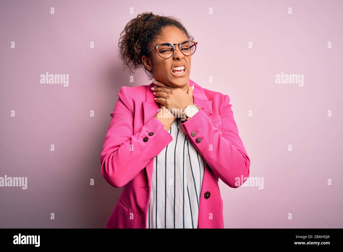 Beautiful african american businesswoman wearing jacket and glasses ...
