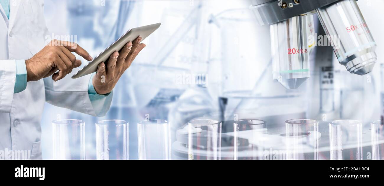 Science research and technology concept Scientist holding tablet
