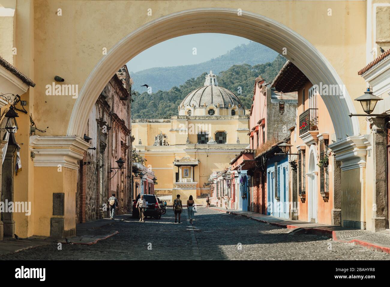 Empty streets as curfew begins in colonial Antigua Guatemala, a popular tourist destination, businesses closed due to coronavirus pandemic quarantine Stock Photo