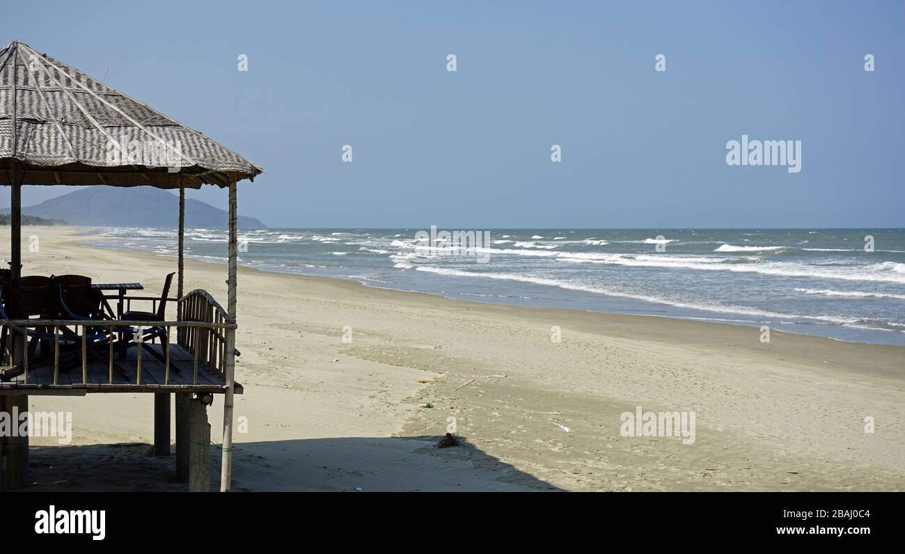 wooden beach hut on a lonely naturl beach Stock Photo