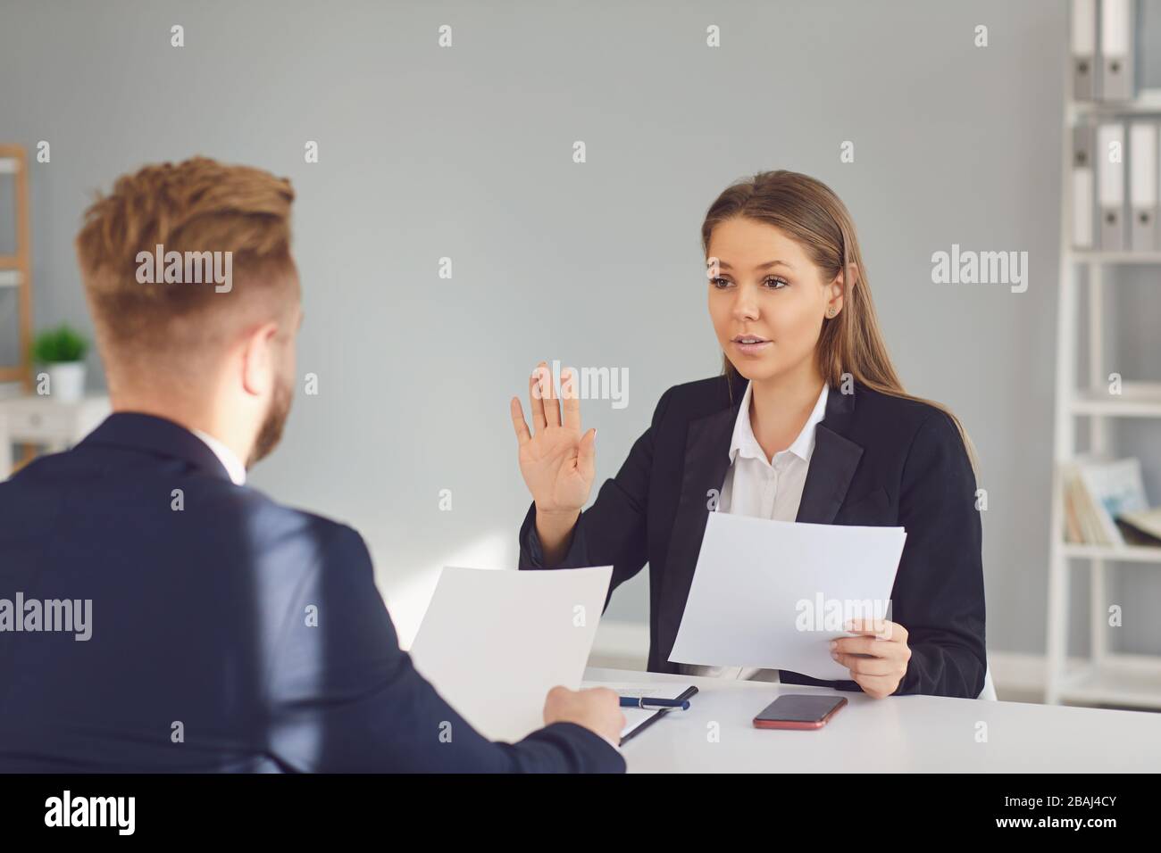 Business people discussing documents in office Stock Photo