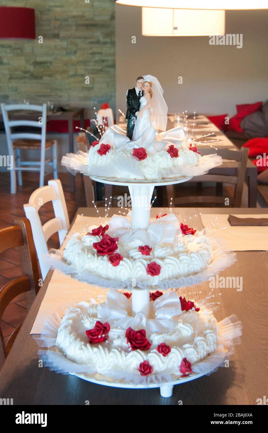 bride and groom for the delicious wedding cake, small statuettes Stock Photo