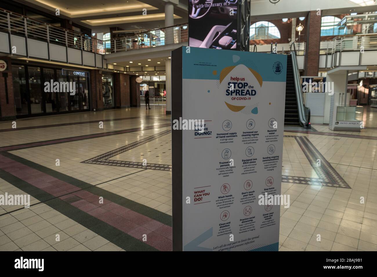 The first day of South Africa's 21 day national lockdown to contain the coronavirus pandemic witnessed a deserted Cape Town V&A Waterfront Stock Photo