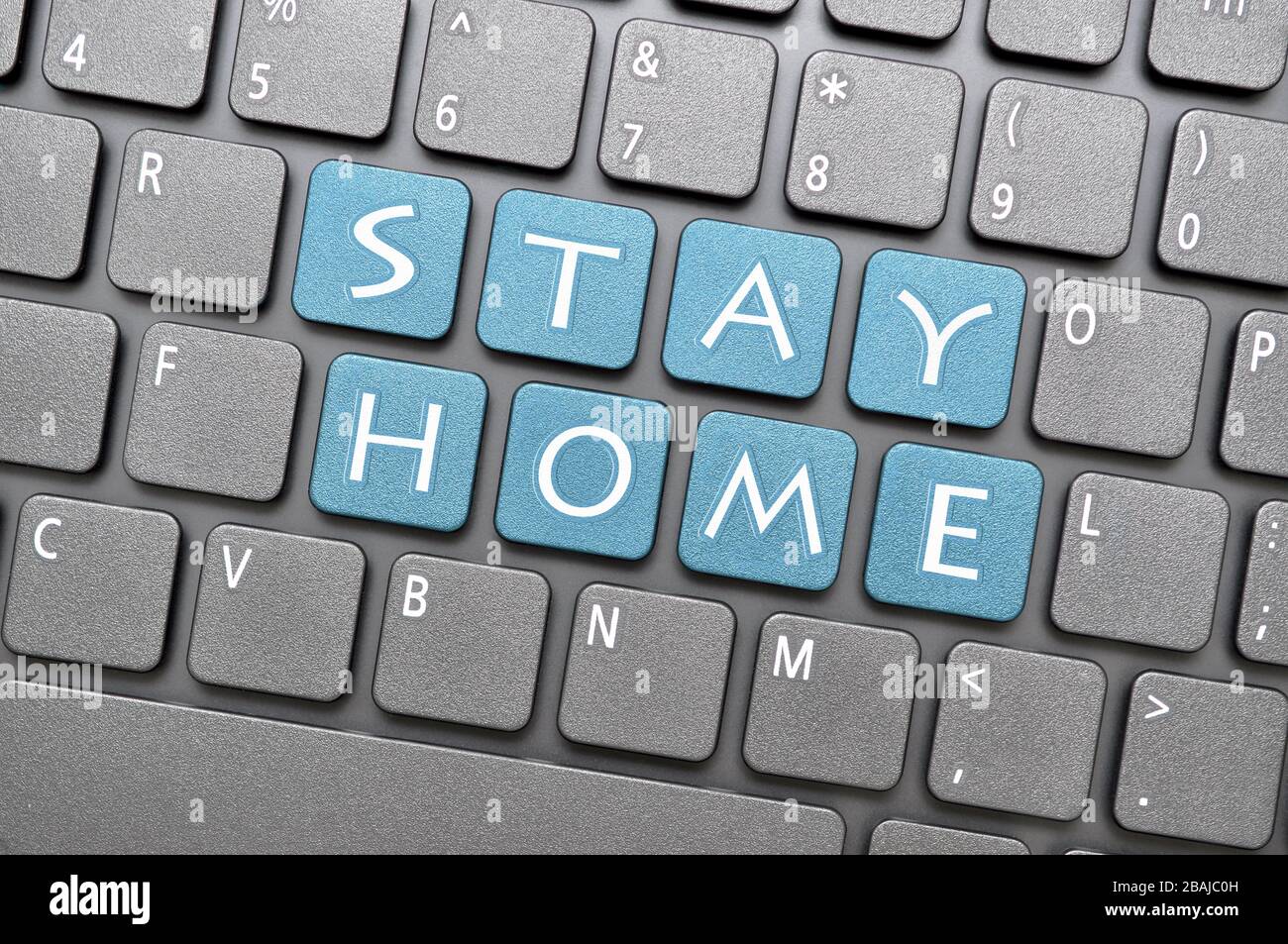 Stay home key on keyboard Stock Photo