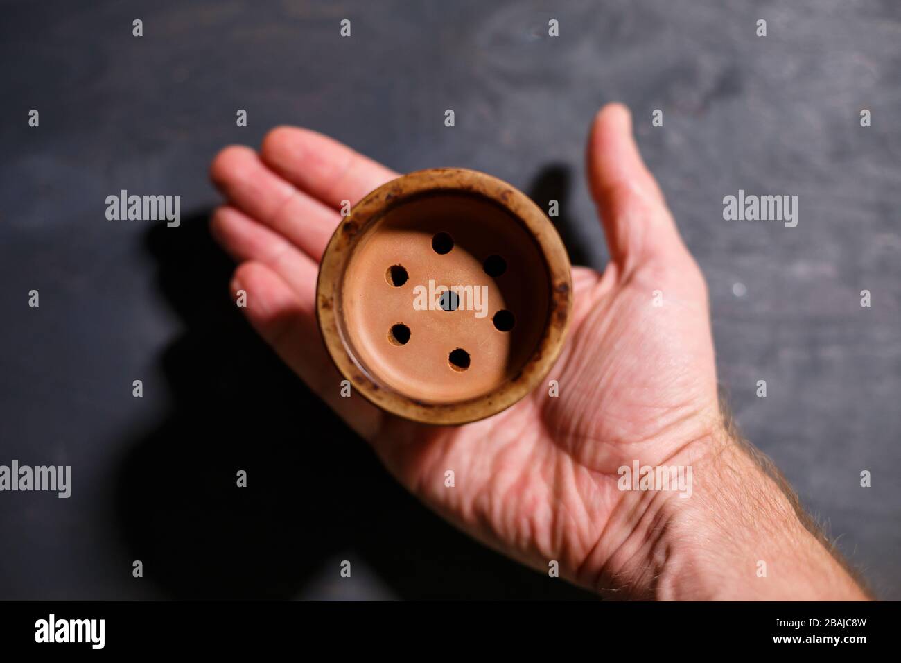 Hookah bowl without tobacco on a gray background Stock Photo Alamy