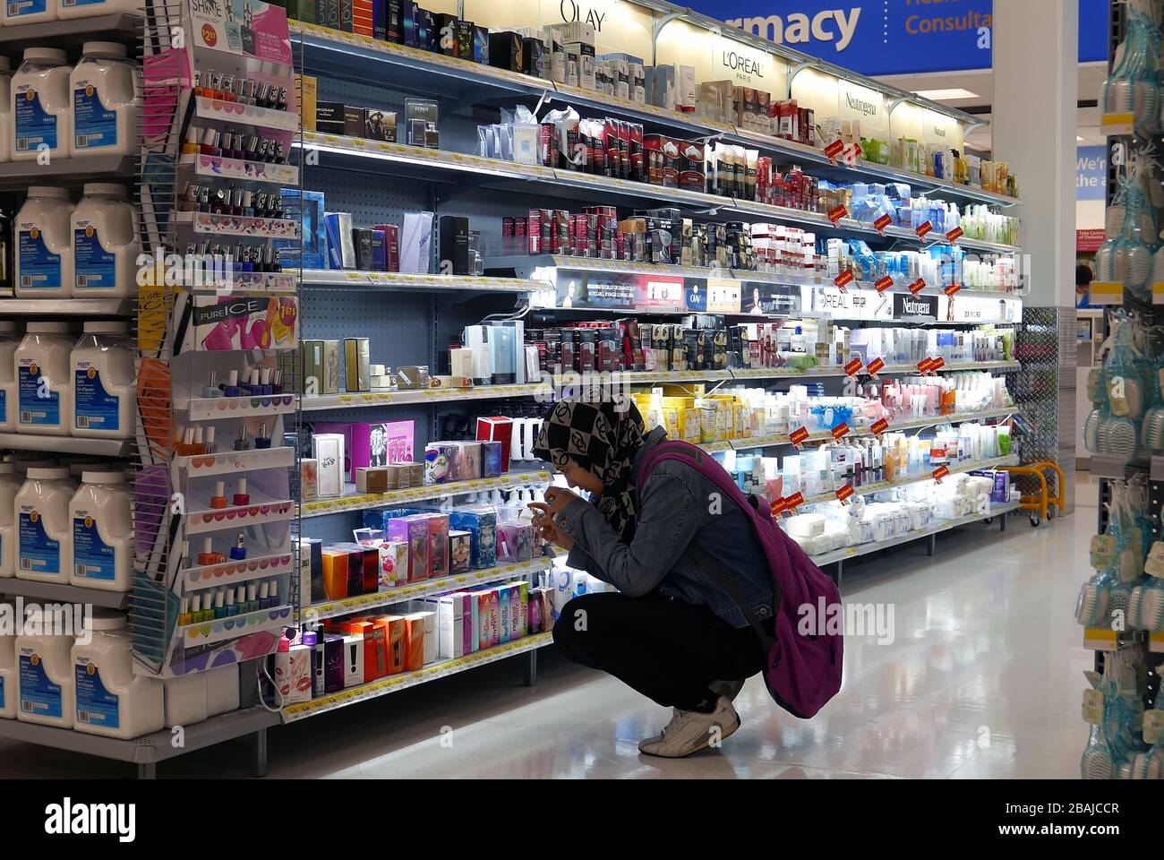 People looking health and beauty products in Walmart store Stock Photo
