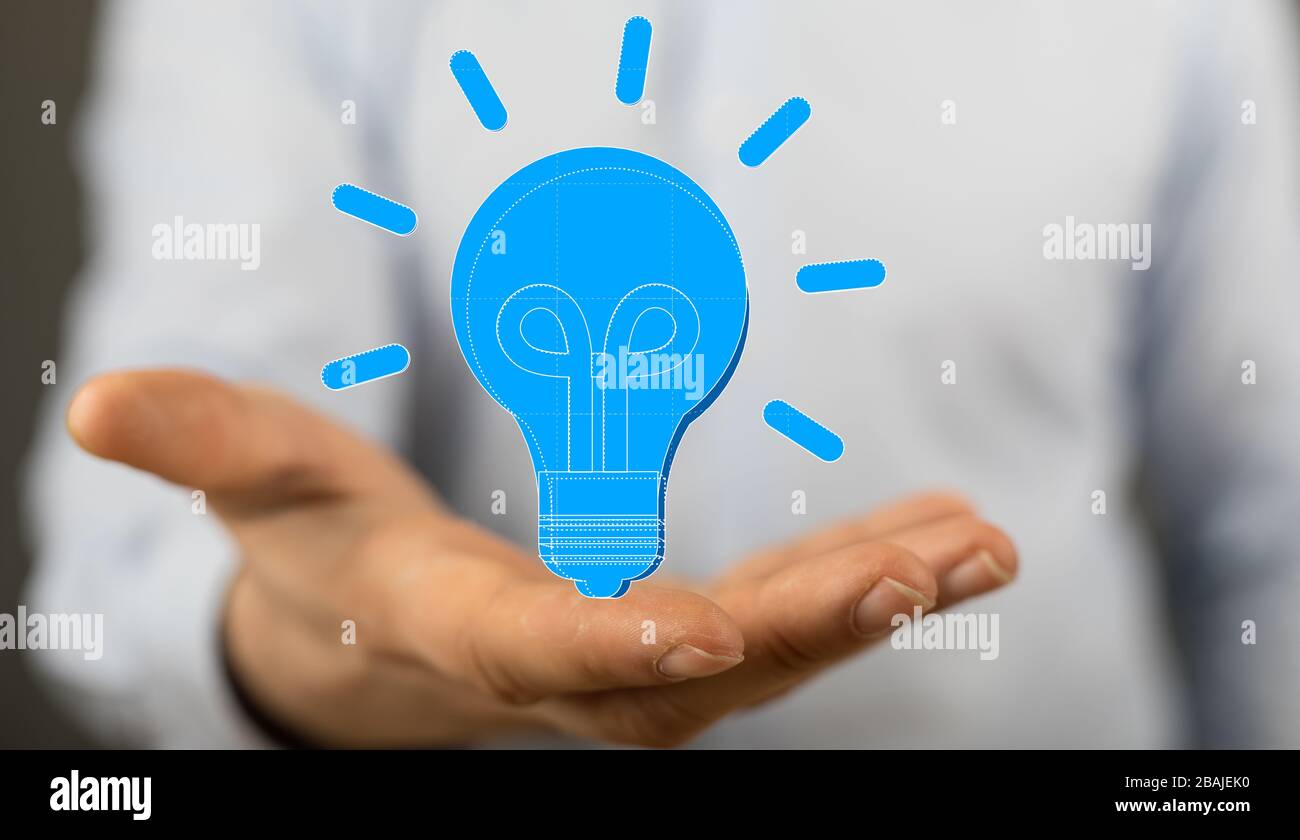 holding illuminated light bulb, idea, innovation and inspiration concept. Stock Photo