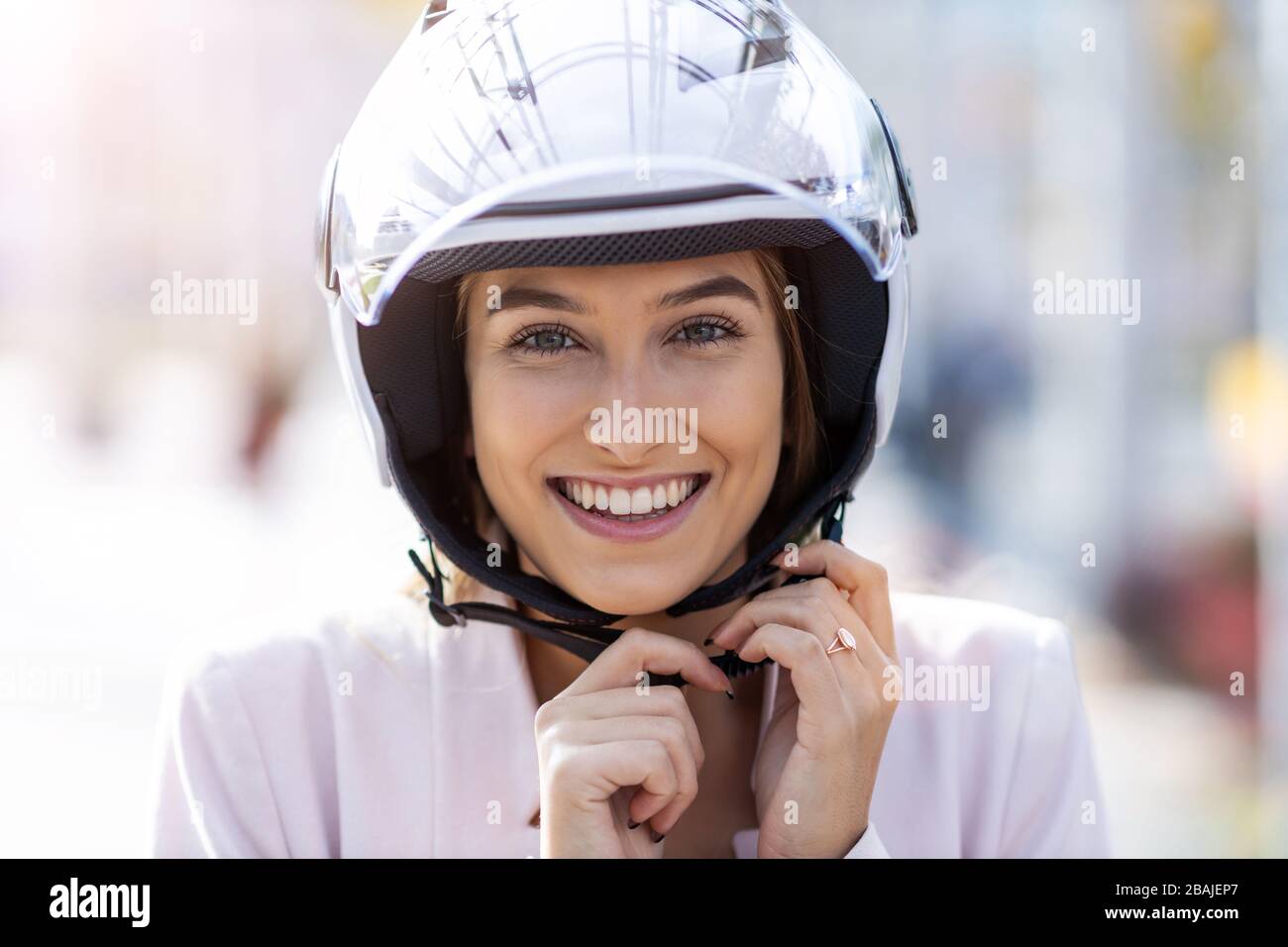 Woman wearing motorbike helmet hires stock photography and images Alamy