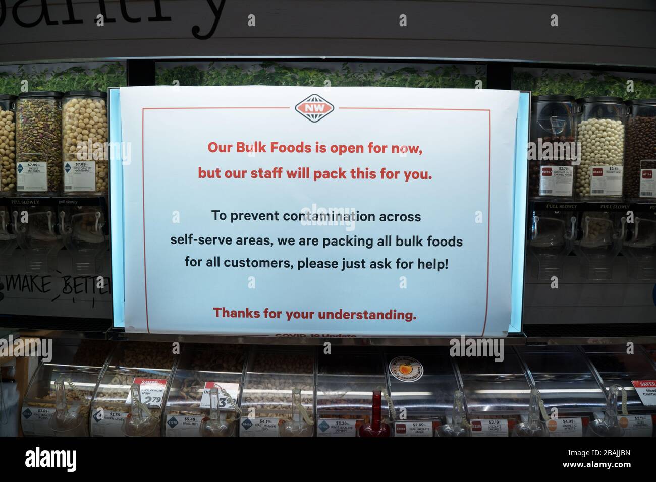 Mission Bay, Auckland / New Zealand - March 28 2020: Sign in New World supermarket stating staff will pack pick and mix foods for customers and shoppe Stock Photo