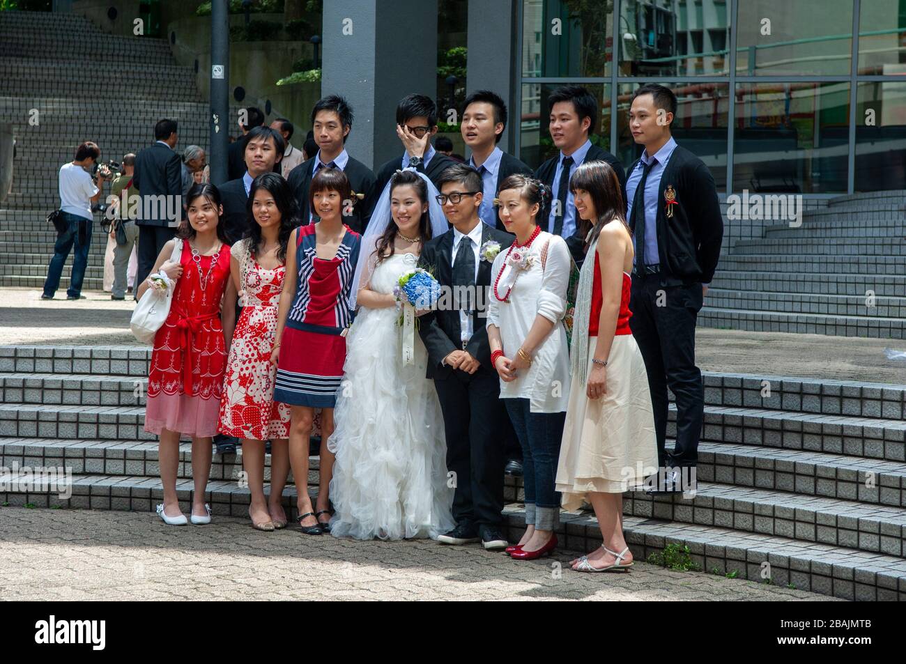 The congested scene of multiple weddings vying for space around Hong Kong Park, Hong Kong SAR Stock Photo