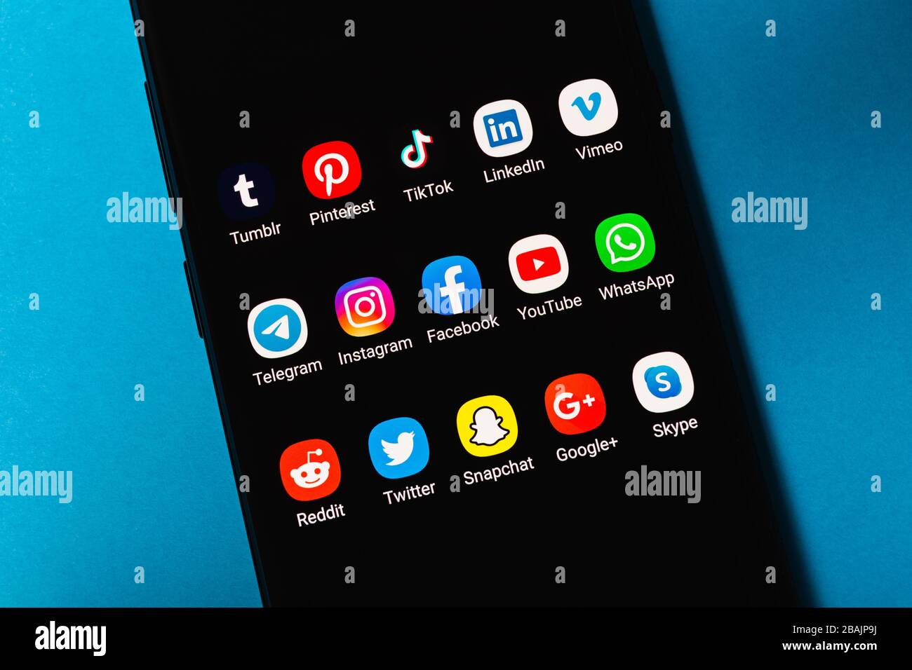 Funchal, Portugal - March 2020: Contemporay social media applications icons on a black modern smartphone screen Stock Photo